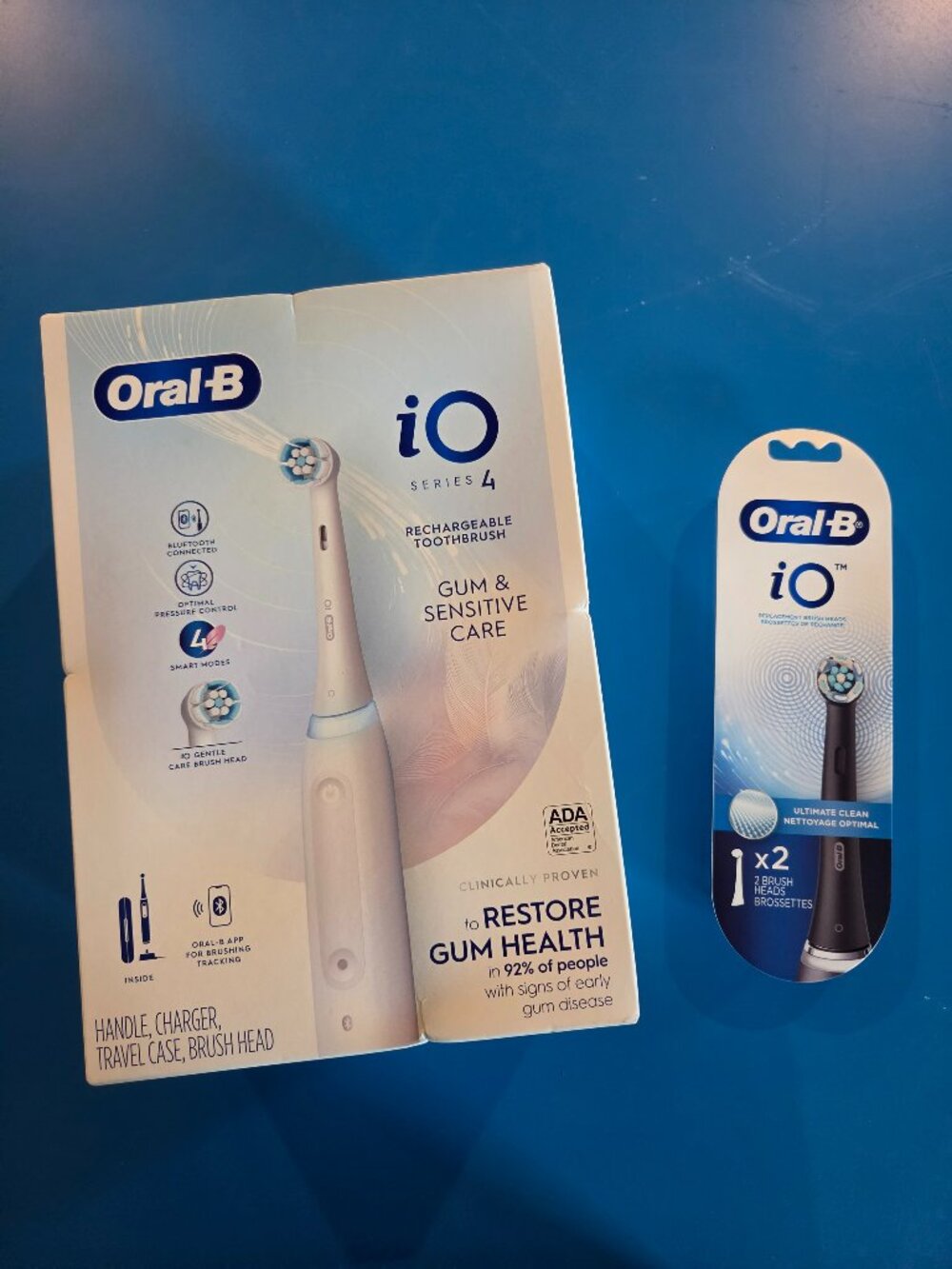 Oral-B iO Series 4 Electric Toothbrush Kit + Extra 2-Pack Ultimate Clean Heads